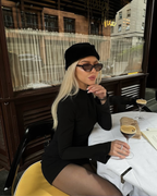 Black Form-Fitting Stretch Mini Dress with Fluted Cuffs – Chic Wedding Guest Cocktail Outfit