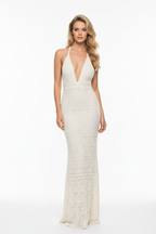Ivory crochet halter mermaid dress front view – plunging V-neckline floor-length formal gown on blonde model