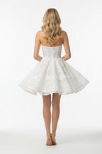 White lace strapless skater mini dress back view – flared party dress on blonde model