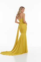 Yellow strapless mermaid formal dress back view – floor-length ruched gown on blonde model